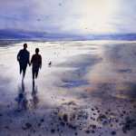 Watercolor painting of sunset reflections on wet pebbly sandy beach
