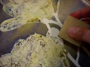 After the watercolor wash is totally dry you can remove the dry art masking fluid with a crepe eraser