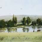 Plein air painting with watercolors of Pond reflections cows hills and trees